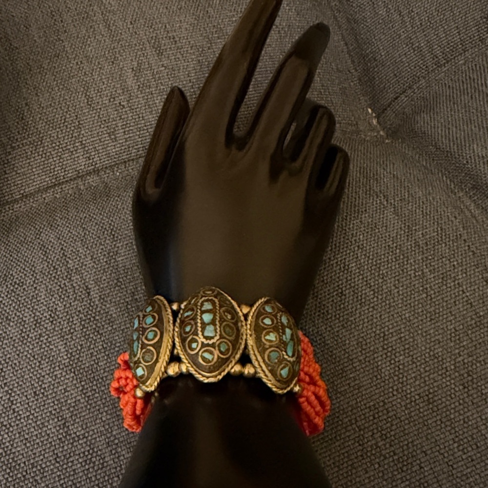 Artisan Made Multi Strand Coral Bead Gold Tone Bracelet with Turquoise Chips.